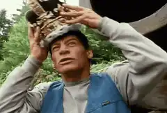 Johnny Weissmuller puts on a crown