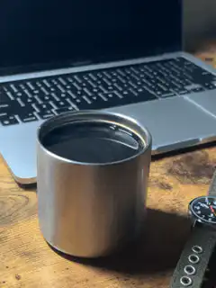 steam rising from coffee cup