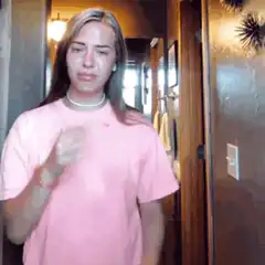Crying girl in pink shirt dancing