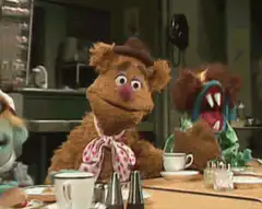Animal laughs at the table