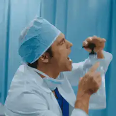 doctor sprays water in mouth