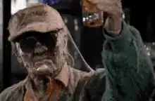 Mummy drinking from a glass