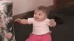 Baby excitedly grabs bitcoin