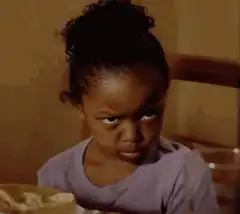 Disapproving little girl side-eye