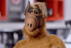 Alf puppet with kitten