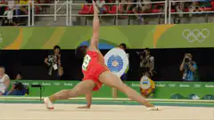 Gymnast performing floor routine