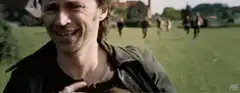 Negan smiling menacingly
