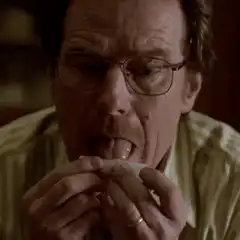 Walter White licking a test tube