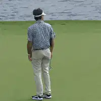 Golfer throws club in frustration