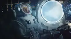 Astronaut in cockpit with dog
