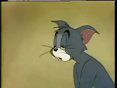 Tom hits himself with a mallet