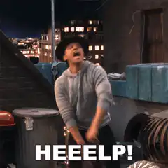 Man in hat yelling heeelp on rooftop