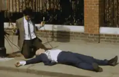 Man on sidewalk gets zapped by electric wires