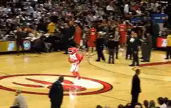 Rocket mascot falls off chair