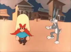 Bugs Bunny and Elmer Fudd in a western town