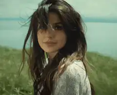 Katie Holmes smiling in the wind