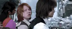 Ron Weasley looks back at Harry Potter