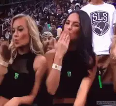 Monster Energy girls and bearded man blowing kisses