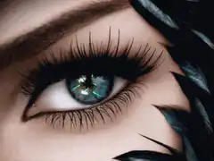 Close-up of a blue eye with a flower reflection