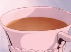 Lemon slice dropped into tea