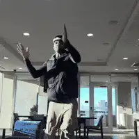 Man dancing in office