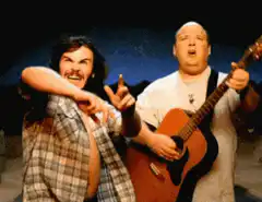 Jack Black and Paul Rudd playing guitar