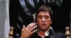 Al Pacino wiping nose in Scarface