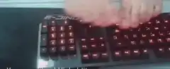 feet typing on keyboard