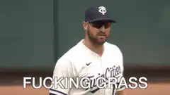 Minnesota Twins player looking down at grass