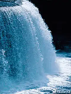 waterfall cascading into pool