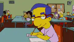 Martin Prince writing in class