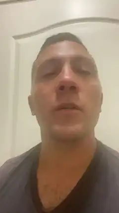 Man with closed eyes and slight smile