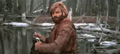 Dwight Schrute turns and smiles