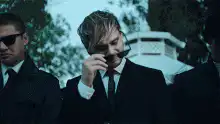 Duncan Jones puts on sunglasses