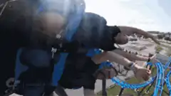 Two men on a roller coaster