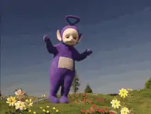 Tinky Winky dancing in a field