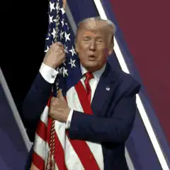 Donald Trump hugging American flag