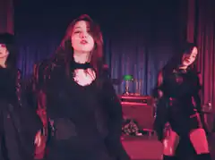Woman dancing in black dress
