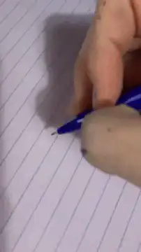 Hand writes You Matter on lined paper