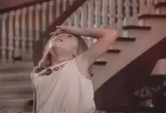 Woman throws herself down the grand staircase