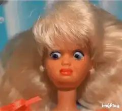Blonde doll with wide eyes