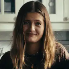Alice making a heart shape with her hands