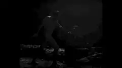 Naked man holding a glowing orb