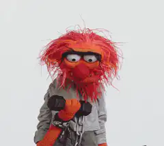 Animal from Muppets with chains