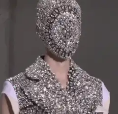 Model in sparkling rhinestone outfit