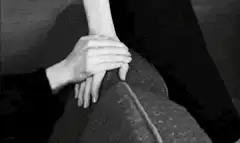 Hand holding wrist on knee