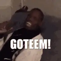 Man laughing hysterically with text GOTEEM
