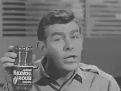 Man drinks Maxwell House coffee