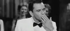 Frank Sinatra blowing a kiss