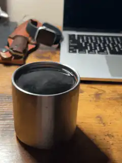 steam rising from coffee cup